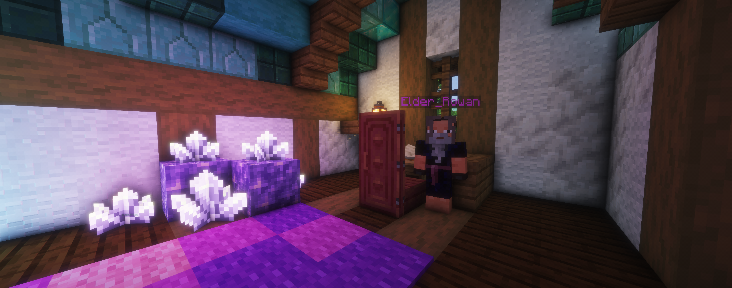 WolfClan interior with glowing purple crystals and a player
